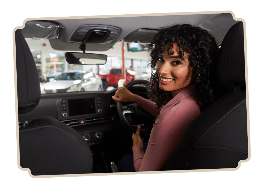 Lady hitting the Road with a Brand-New Car, thanks to a First Citizens car loan